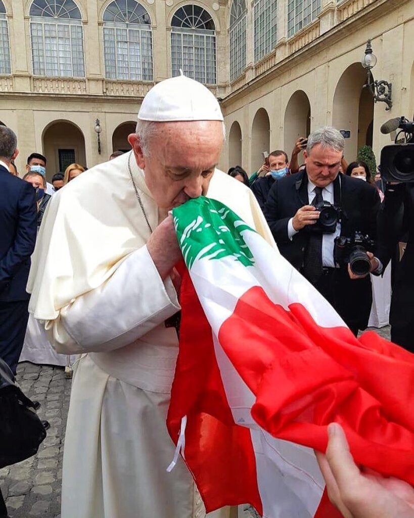 pope Francis kisses Lebanese flag and announces universal religious day for lebanon