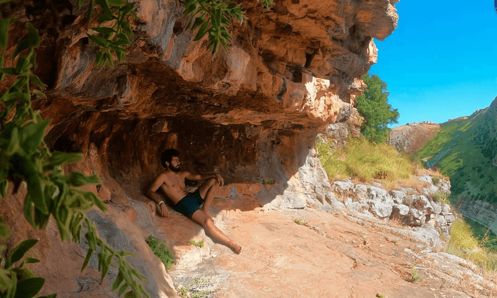 Meet lebanon's real life tarzan thestrollingtarzan relaxing in cave in lebanon